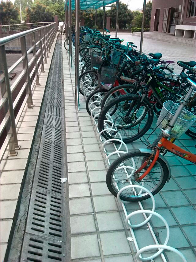 學(xué)習(xí)專用圓籠碳素鋼自行車停車架,學(xué)校專用圓籠自行車停放架廠家找東莞新恒安